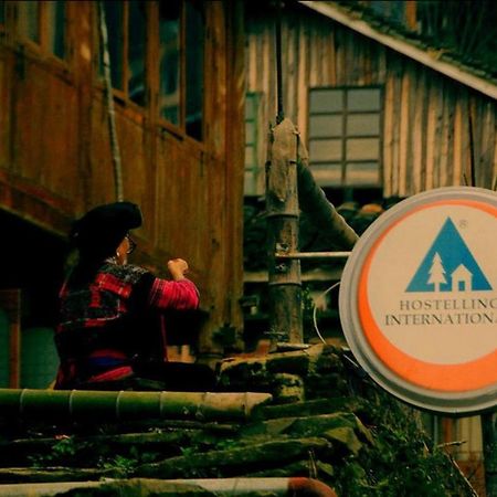 Dragon'S Den Hostel Луншэн Экстерьер фото