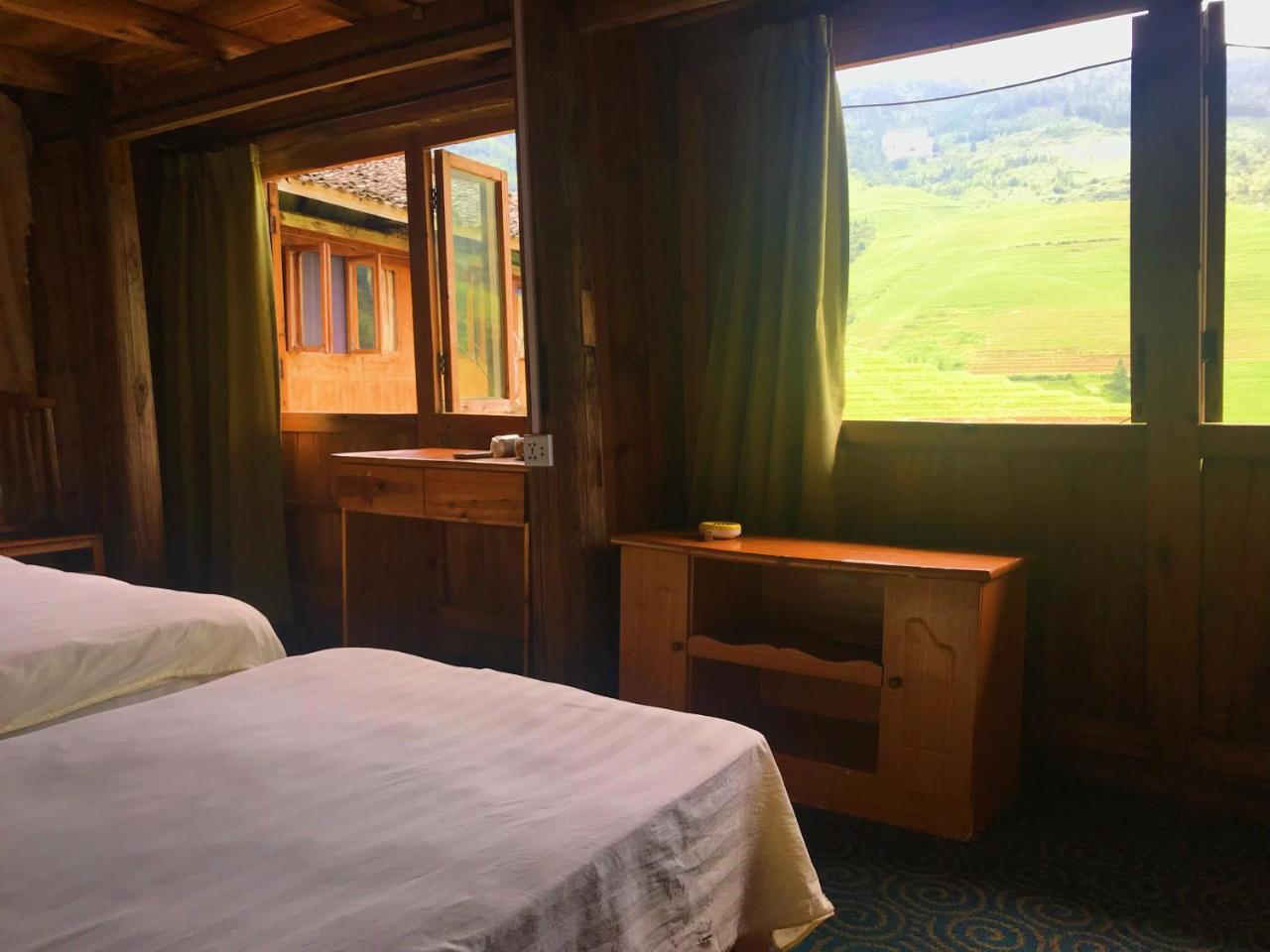 Dragon'S Den Hostel Луншэн Экстерьер фото
