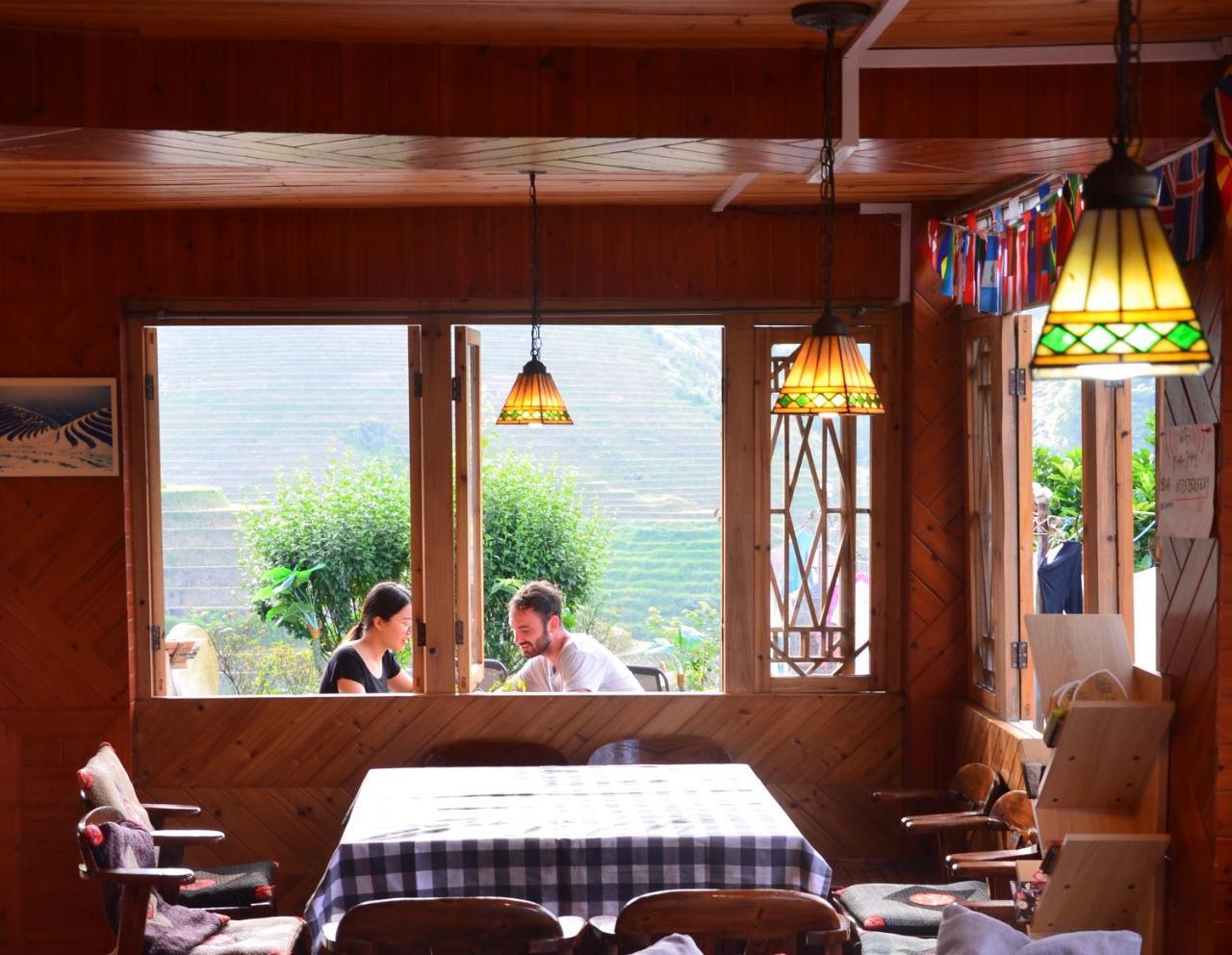 Dragon'S Den Hostel Луншэн Экстерьер фото