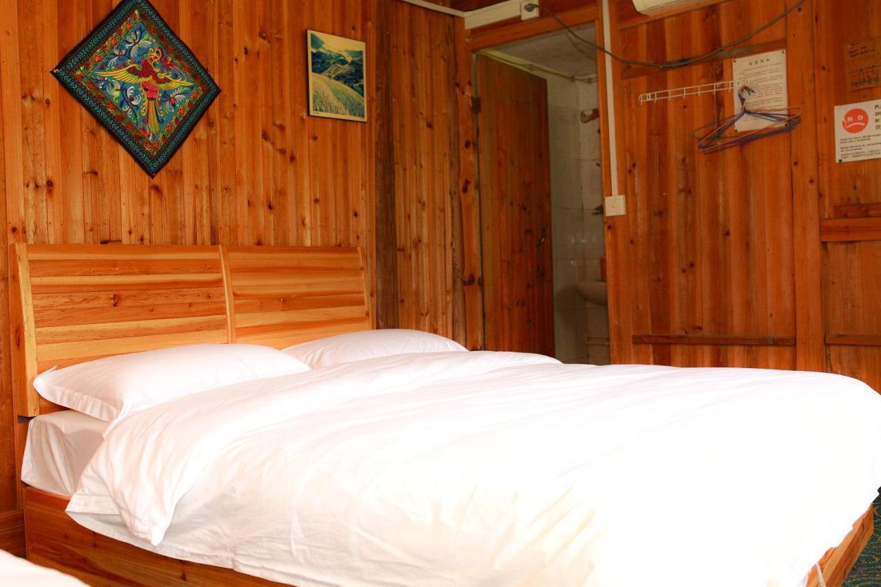 Dragon'S Den Hostel Луншэн Экстерьер фото