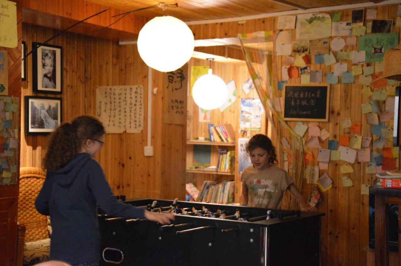 Dragon'S Den Hostel Луншэн Экстерьер фото