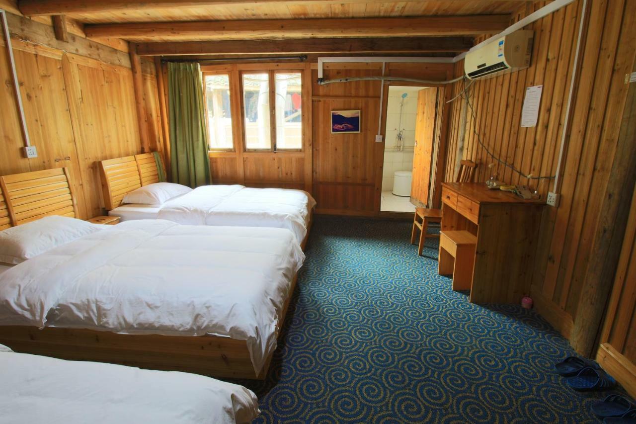 Dragon'S Den Hostel Луншэн Экстерьер фото
