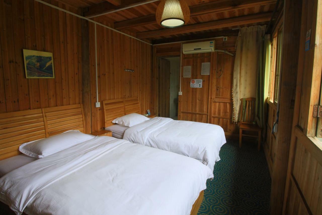 Dragon'S Den Hostel Луншэн Экстерьер фото