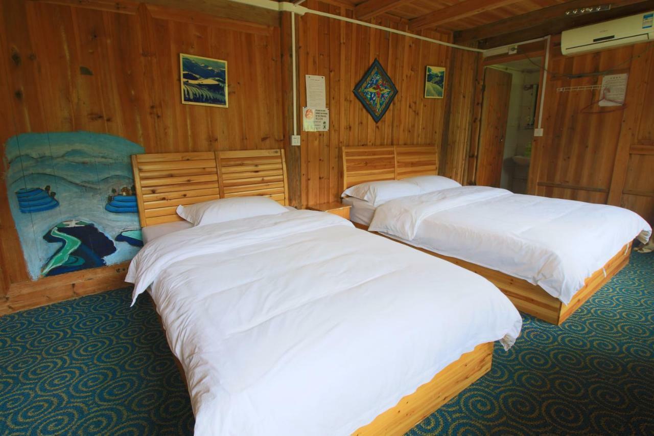 Dragon'S Den Hostel Луншэн Экстерьер фото