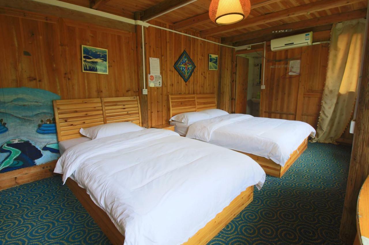 Dragon'S Den Hostel Луншэн Экстерьер фото