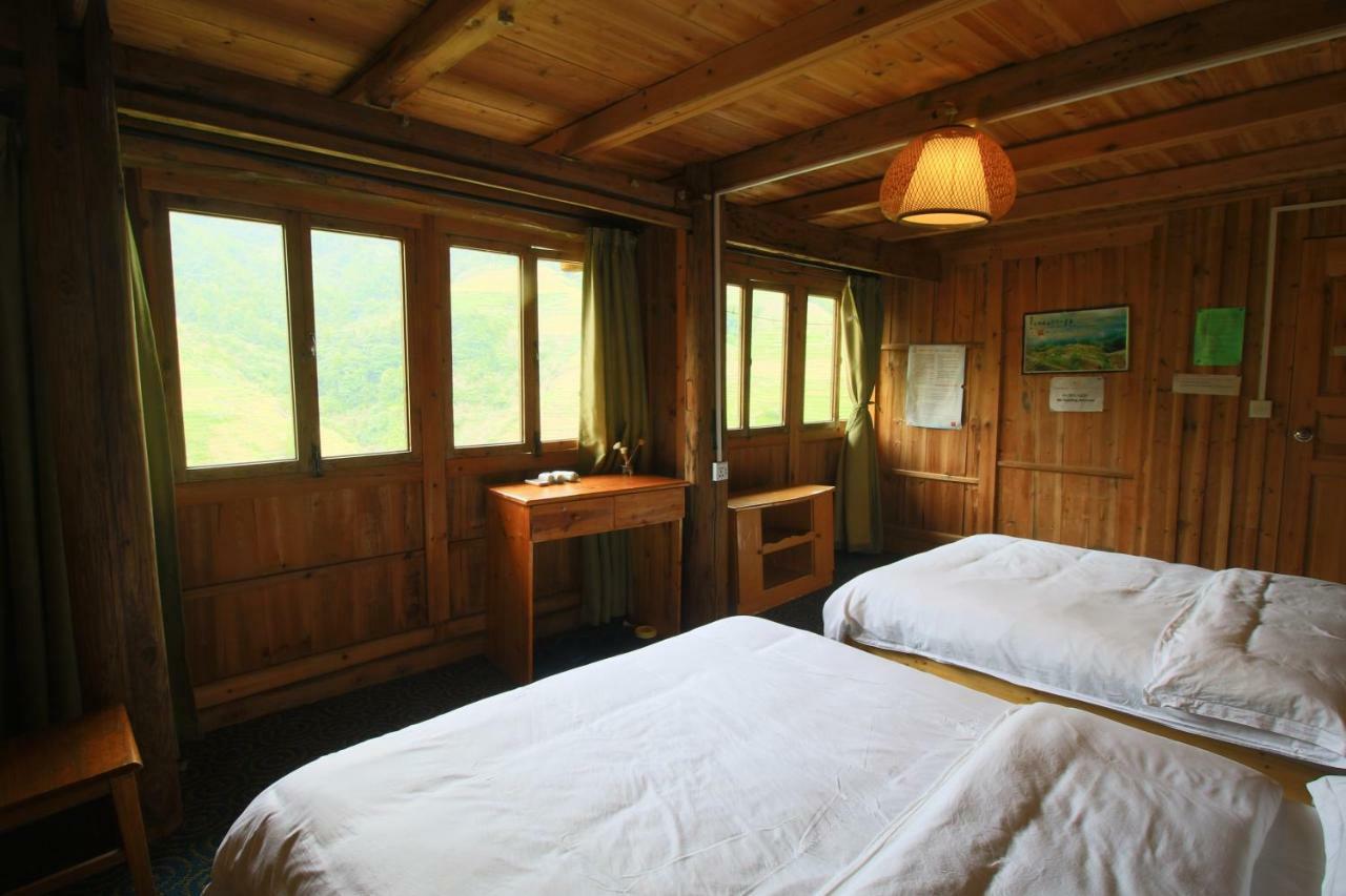 Dragon'S Den Hostel Луншэн Экстерьер фото