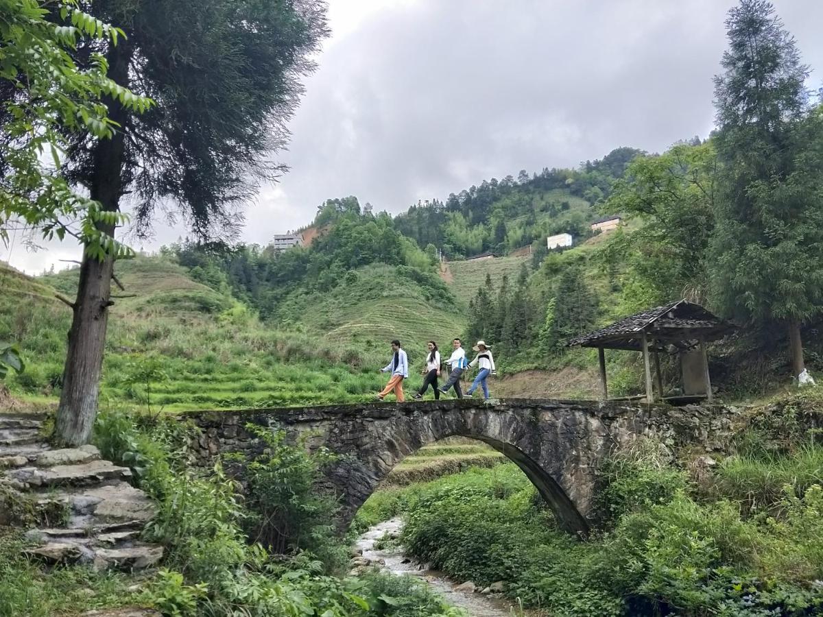 Dragon'S Den Hostel Луншэн Экстерьер фото